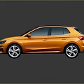 Orange Hatchback Car With Black Roof Silver Alloy Wheels And Modern Front Grille