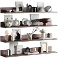 Chic Decorative Ornaments Set On Wooden Shelves With Vases Bowls Sculptures And Books