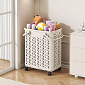 White Perforated Storage Basket With Wheels Holding Towels Balls And Toiletries
