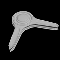 White Plastic Triangular Clip With Functional Design For Household Use On Black Background