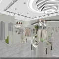 Stylish Clothing Store With White Interior Mannequins Hanging Clothes And Plants