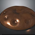 Copper Colored Circular Aerospace Object With Lunar Surface Like Holes For Space Exploration