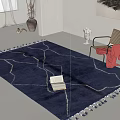 Blue Square Area Rug With White Line Patterns Tassels Open Book And Red Cloth Chair