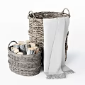 Gray Wicker Storage Baskets with Rolled Items and Blanket for Home Organizing 3d model
