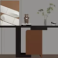 Modern Console Table Design with Abstract Artwork Decorative Figurine and Potted Plant in Warm Tones