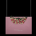 Decorative Pink Envelope Adorned With Red White Roses And Green Leaves