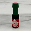 Tabasco Kitchen Spice Bottle With Green Cap Red Label And Black Body