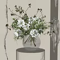 Silver Textured Vase With White Flowers Green Leaves And Branches On White Pedestal