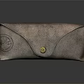 Brown Leather Eyeglass Case With Metal Clasp And Emblem Design
