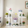 Decorative Multi tier Wooden Plant Shelf With Colorful Potted Flowers And Green Plants