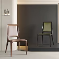 Modern Leisure Chairs With Brown Leather And Green Fabric Seats In Stylish Interior Space