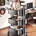 Multi Tier Rolling Storage Rack with Magazines Camera And Books in Modern Office Workspace