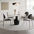 Modern Dining Table Set With Round Marble Top Black Base And Four Metal Leg Chairs