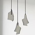 Modern Pendant Lights With Unique Curved White Shades Hanging In Interior Space