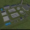Industrial Factory Complex With Multiple Buildings Green Lawn And Access Roads