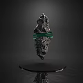 Abstract Rock Sculpture With Green Transparent Ring On Black Base And Reflection 3d model