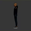 Man Standing With Arms Outstretched In Dark Long Sleeve Top And Pants