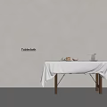 Tablecloth Covered Wooden Table With Bowl Fruits And Black Vase In Minimalist Interior