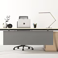 Modern Office Desk Setup With MacBook Lamp Plant Pencil Holder And Chair
