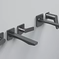 Three Black Modern Minimalist Faucets Mounted on Gray Wall Surface Design