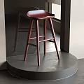Stylish Red Bar Stool With Modern Wooden Legs In Indoor Setting