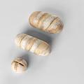 Fresh Homemade Bread in Different Shapes and Sizes with Striped Patterns on White Background