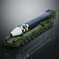 Green Mobile Military Vehicle with Multiple Wheels Carrying Long Range Missile