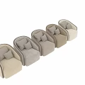 Beige Upholstered Accent Chair with Patterned Pillows Sleek Armrests and Modern Style