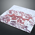 Red and White Mountain Range with Geometric Polygonal Design Printed on Paper Against Gray Tabletop