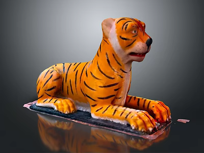 Decorative Lying Tiger Shaped Figure With Orange Black Striped Body On Base 3d model