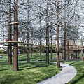 Elevated Wooden Children's Play Area With Tree House Slide Stairs And Grass Surroundings