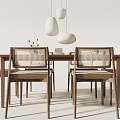 Modern Wooden Dining Table Set With Woven Back Chairs And White Pendant Lights