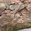 Natural Rock Surface With Detailed Cracks And Rugged Textured Patterns 3d model