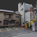 Urban Buildings Surrounding Parking Lot With Old Structures And Kirin Sign