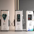 Three Modern Public Electric Vehicle Charging Stations With Digital Screens And Charging Ports