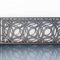Hinged Door Featuring Metal Frame Intricate Hollow Out Circular Geometric Patterns On White Wall
