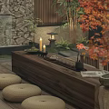 Japanese Style Courtyard Garden With Wooden Tea Table Candles And Autumn Leaves