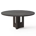 Round Wooden Dining Tables with Unique Leg Designs in Light and Dark Wood Tones