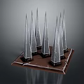 Modern Spire Like Architectural Structures Arranged On Square Base With Contemporary Design Elements 3d model