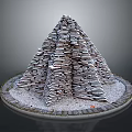 Stone Pyramid Architectural Structure with Stacked Stones on Circular Base Surrounded by Gravel