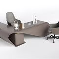 Modern Office Desk With Unique Curved Shape Two Gray Chairs Computer Monitor And Desk Lamp