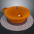 Circular Orange Object With Holes On Surface Spiral Center And Gray Brick Base