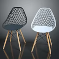 Stylish Modern Black and White Chairs Featuring Mesh Design and Wooden Legs