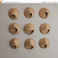 Light Brown Face Shaped Wall Decor With Various Expressions Arranged In Grid 3d model