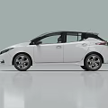 White Electric Hatchback With Black Roof Sleek Body And Modern LED Headlights