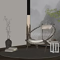 Modern Woven Round Leisure Chair With White Cushion Side Table Floor Lamp And Green Plants