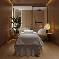 Modern Beauty Treatment Room Featuring Massage Bed White Sheets Plant Table Lamp And Wooden Floors