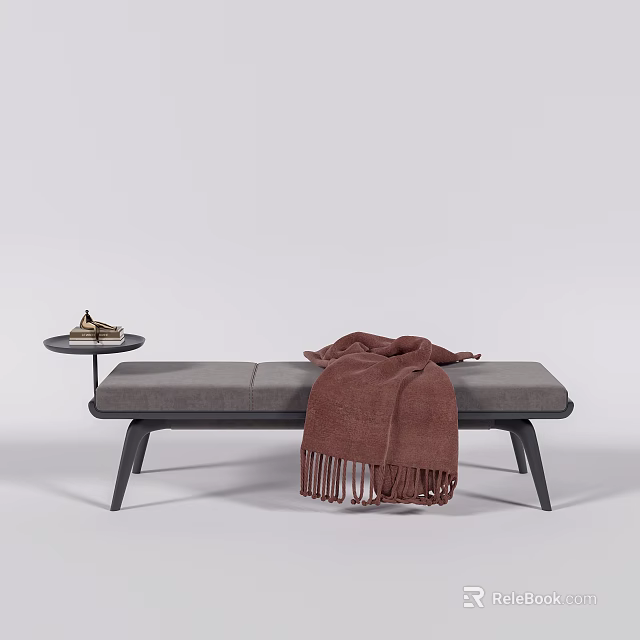 Gray Sofa Bench With Brown Fringed Blanket And Side Table With Books 3d model 