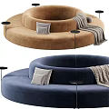 Two Seater Circular Velvet Sofa Upholstered Beige Gray With Pillows Throw Blanket Side Tables