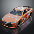 Orange Toyota Race Car With ARRIS Logo Number 19 And FOMOCO Branding